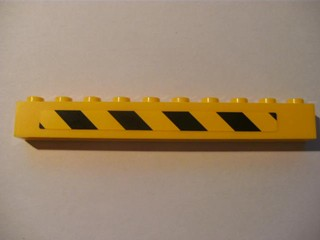 6111pb008L | Brick 1 x 10 with Black and Yellow Danger Stripes Pattern Left (Sticker) - Set 7633 | LEGOPART