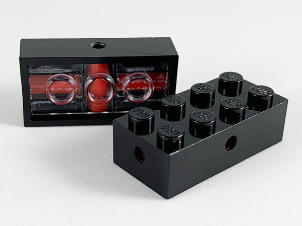 7049b | Brick, Modified 2 x 4 with Wheels Holder, Trans-Clear Bottom | LEGOPART